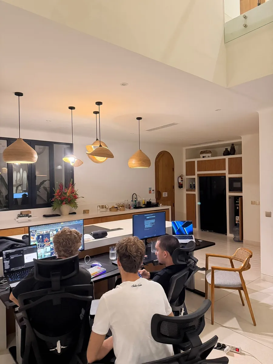The team at their desks in the studio