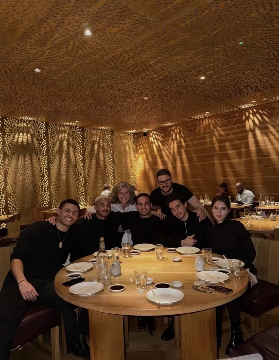 The RedPxl team at dinner around a round table