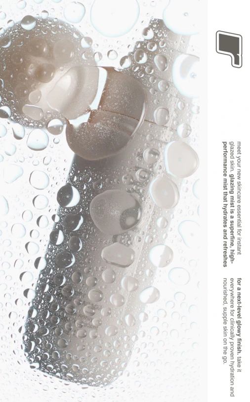A clear bottle covered in water droplets.
